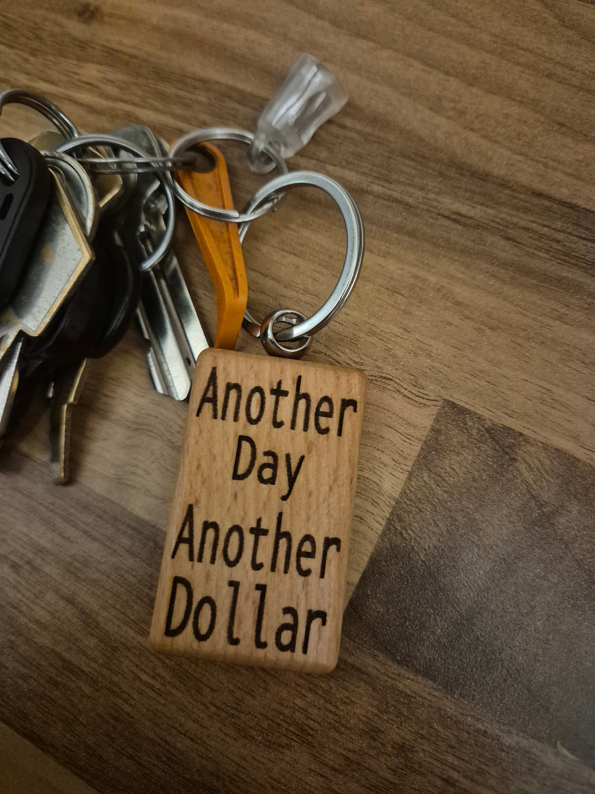 Another day another dollar keyring
