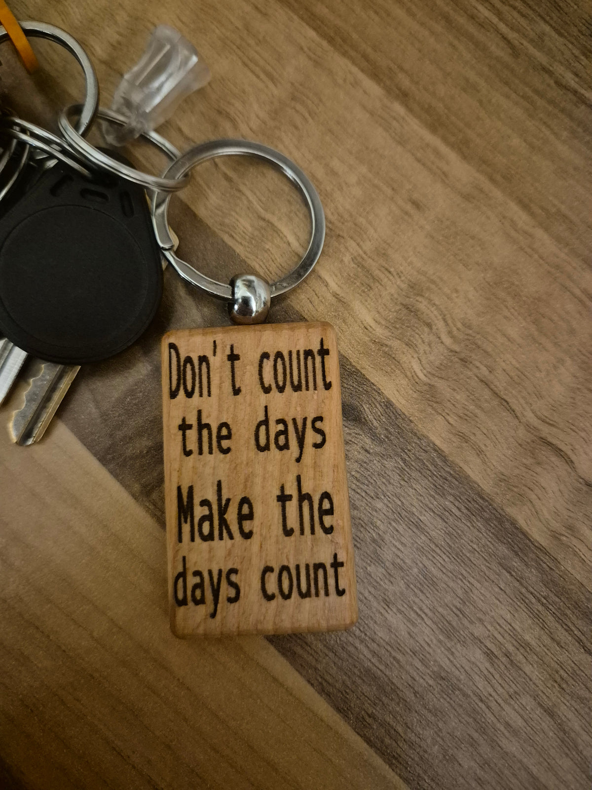Don't count the days, make the days count keyring.